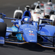 Indianapolis 500 pole sitter Scott Dixon leads a pack of cars during practice. Photo credit: AP Photo/Michael Conroy